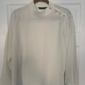 White with faux pearls blouse